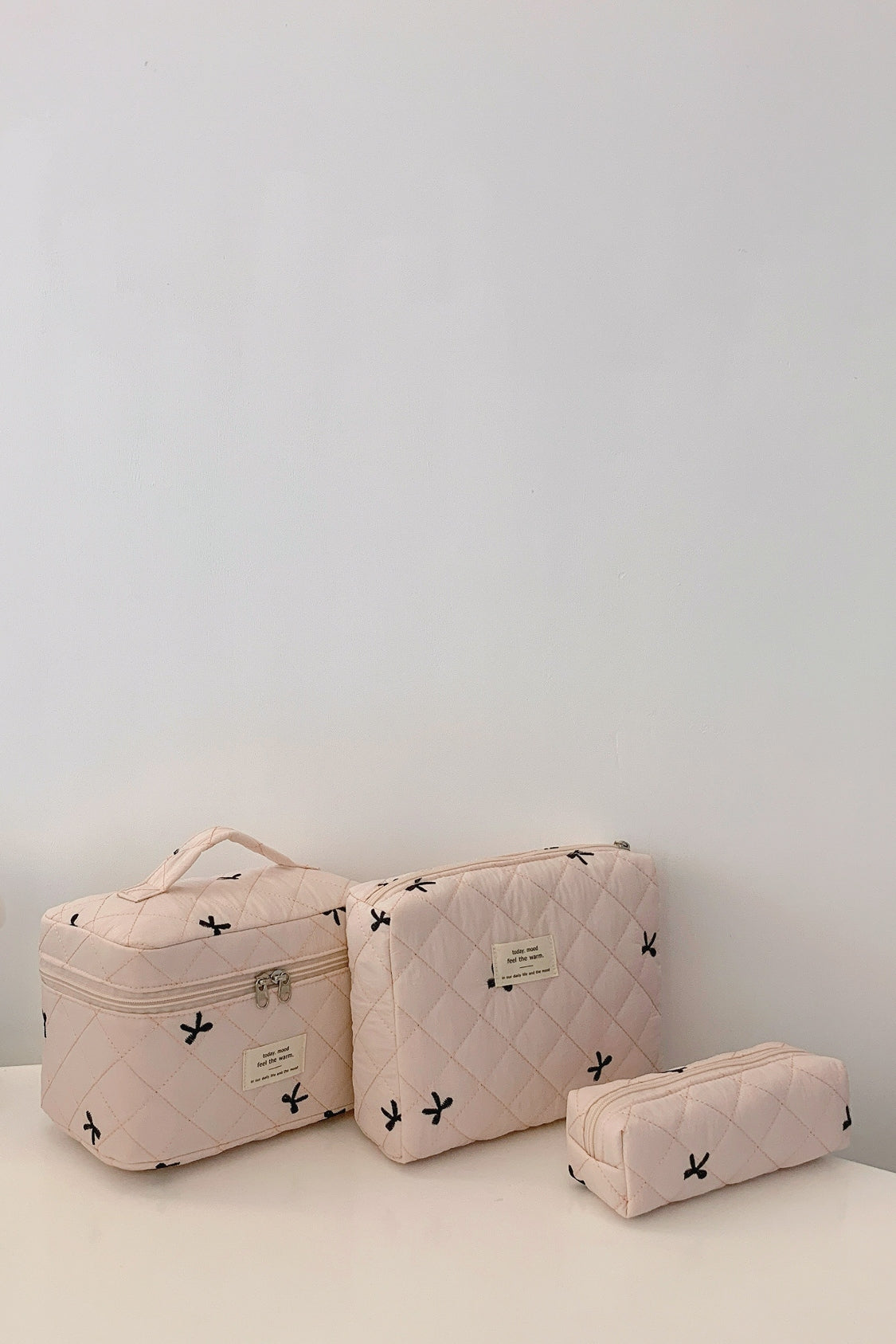 Three Piece Bow Quilted Cloth Storage Bag Set