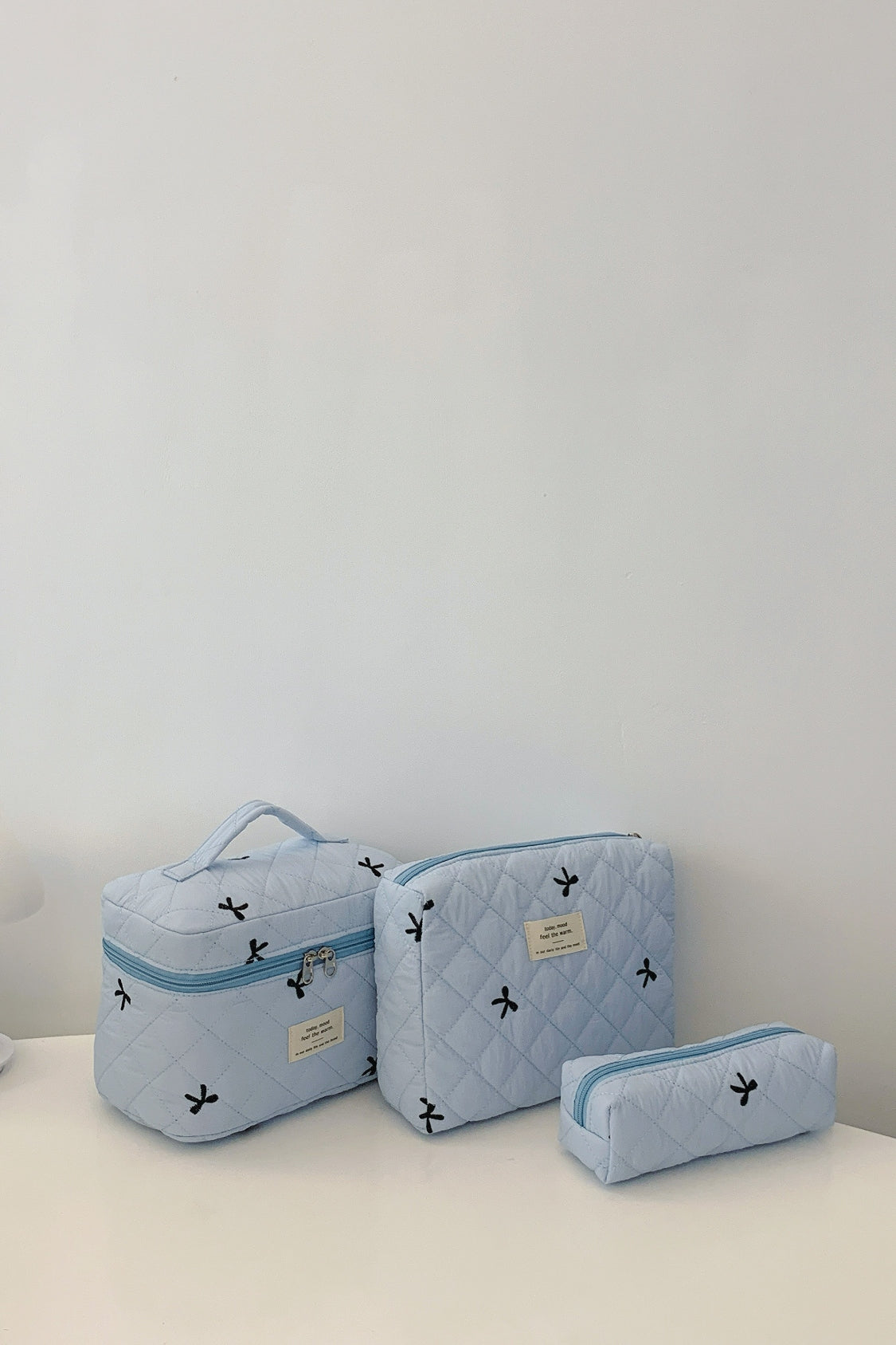 Three Piece Bow Quilted Cloth Storage Bag Set